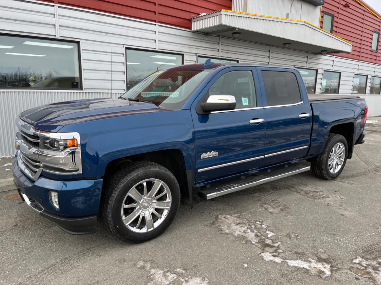 2017 Blue /black leather Chevrolet Silverado 1500 High Country Crew Cab Short Box 4WD (3GCUKTEJ2HG) with an 6.2L V8 OHV 16V engine, 6A transmission, located at 1960 Industrial Drive, Wasilla, 99654, (907) 274-2277, 61.573475, -149.400146 - Photo#0